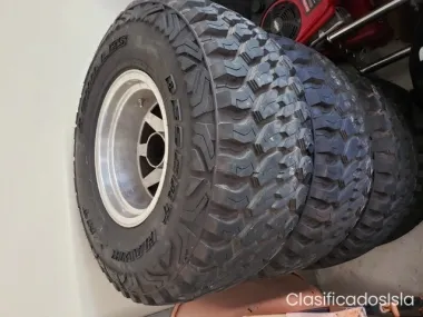 4-Gomas Nuevas  con arros para jeep 1979