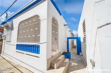 The property has 4 bedrooms, 2 bathrooms, living room-dining